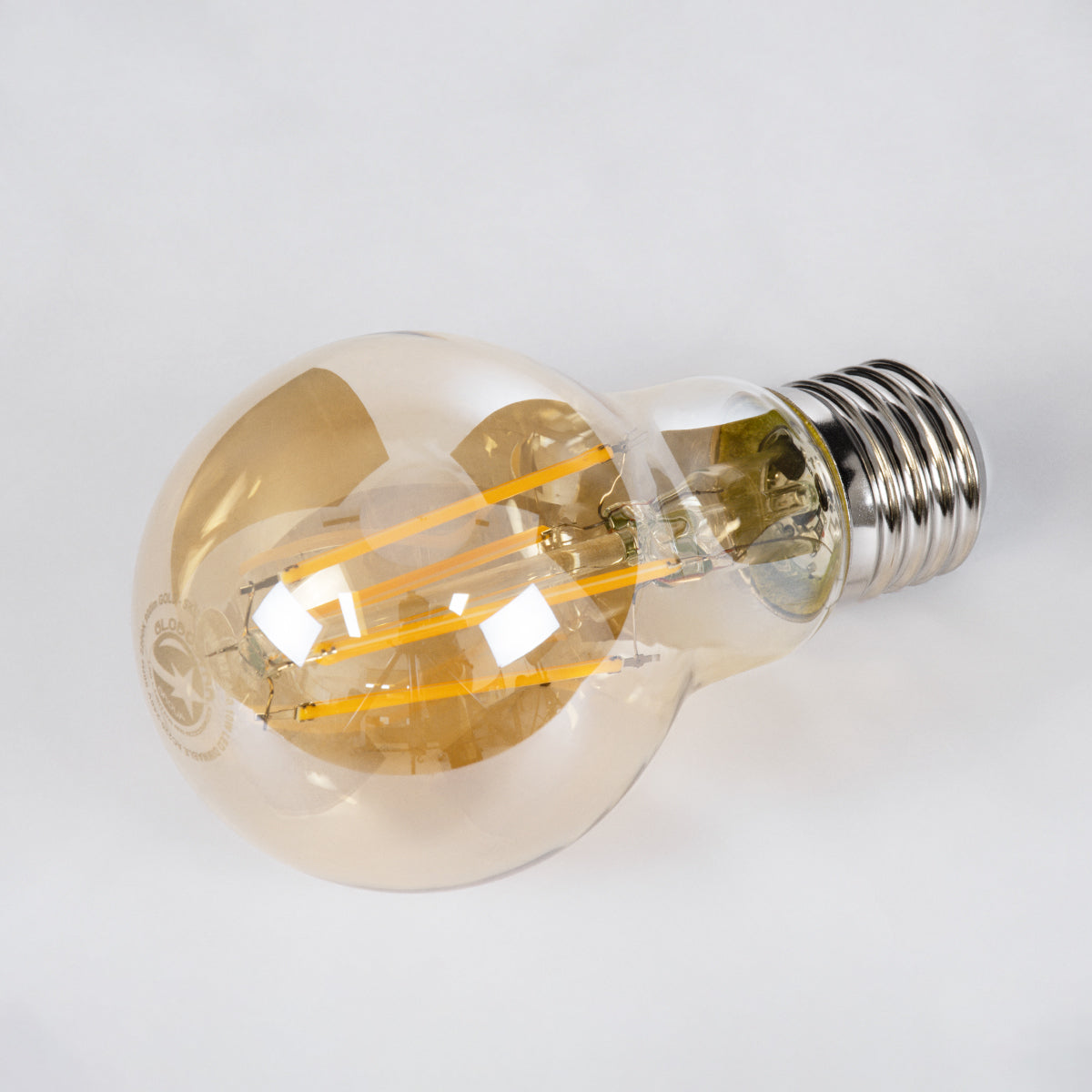 GloboStar® 99038 LED Long Filament Bulb E27 A60 Globe 10W 900lm 360° AC 220-240V IP20 D6 x H10.5cm Ultra Θερμό Λευκό 2200K με Μελί Γυαλί - Dimmable - 3 Years Warranty