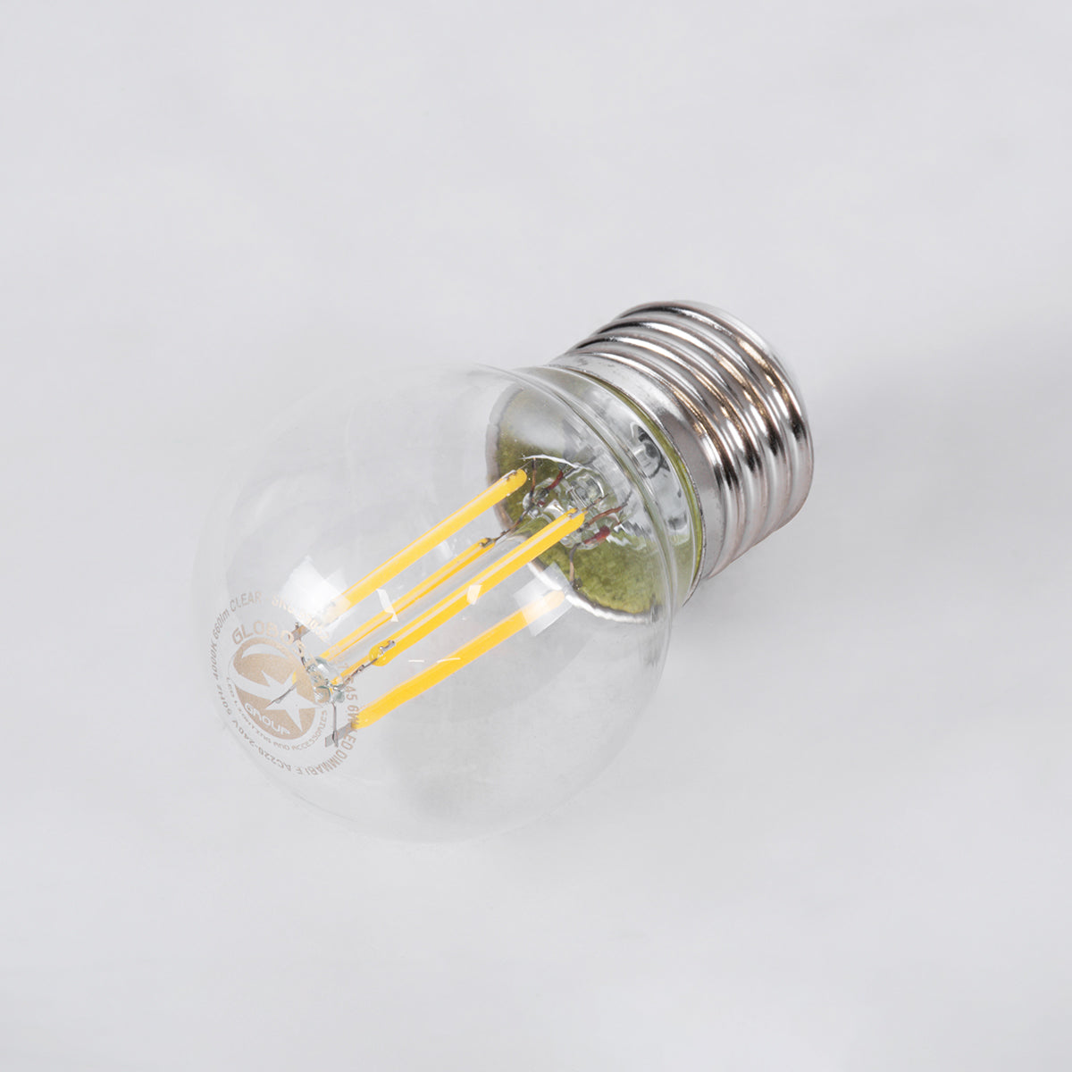 GloboStar® 99052 Λάμπα LED Long Filament E27 G45 Γλομπάκι 6W 660lm 360° AC 220-240V IP20 Φ4.5 x Υ7.5cm Φυσικό Λευκό 4000K με Διάφανο Γυαλί - Dimmable - 3 Years Warranty