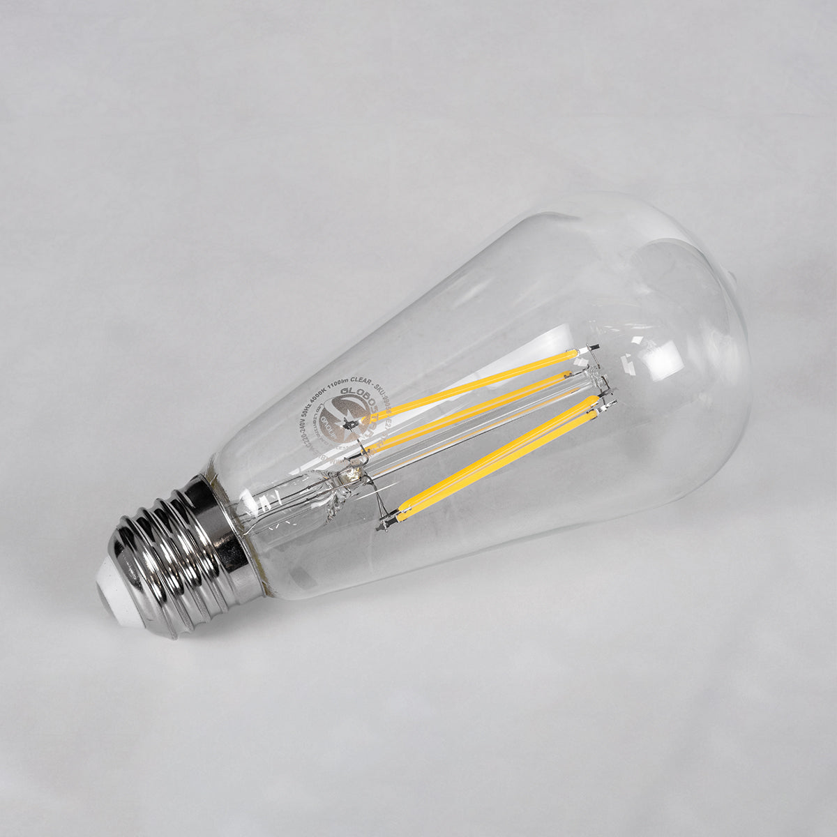 GloboStar® 99056 Λάμπα LED Long Filament E27 ST64 Αχλάδι 10W 1100lm 360° AC 220-240V IP20 Φ6.4 x Υ14cm Φυσικό Λευκό 4000K με Διάφανο Γυαλί - Dimmable - 3 Years Warranty