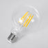 GloboStar® 99088 Λάμπα LED Long Filament E27 G95 Γλόμπος 7W 1470lm 360° AC 220-240V IP20 Φ9.5 x Υ13.8cm Θερμό Λευκό 2700K με Διάφανο Γυαλί - Pro Series 210lm/W - A Ενεργειακή Κλάση - 3 Χρόνια Εγγύηση